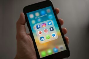 Social media apps on a phone. Facebook, Instagram, Twitter, Pinterest, tumblr, LinkedIn, WhatsApp, and more